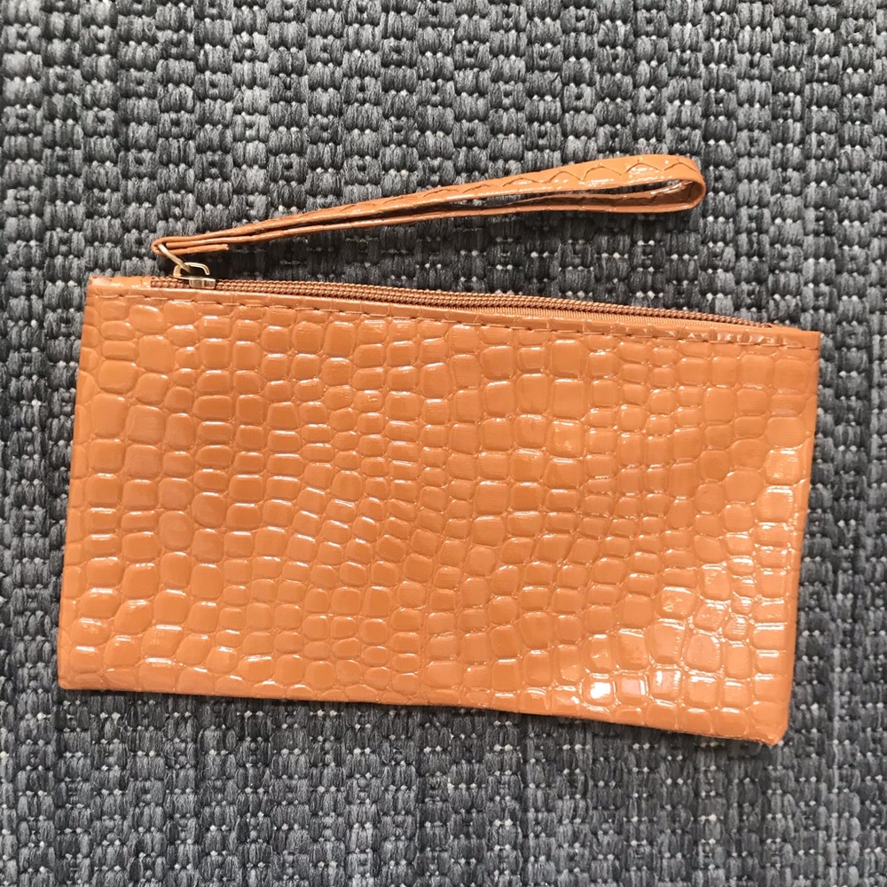3/$10 Camel colored clutch